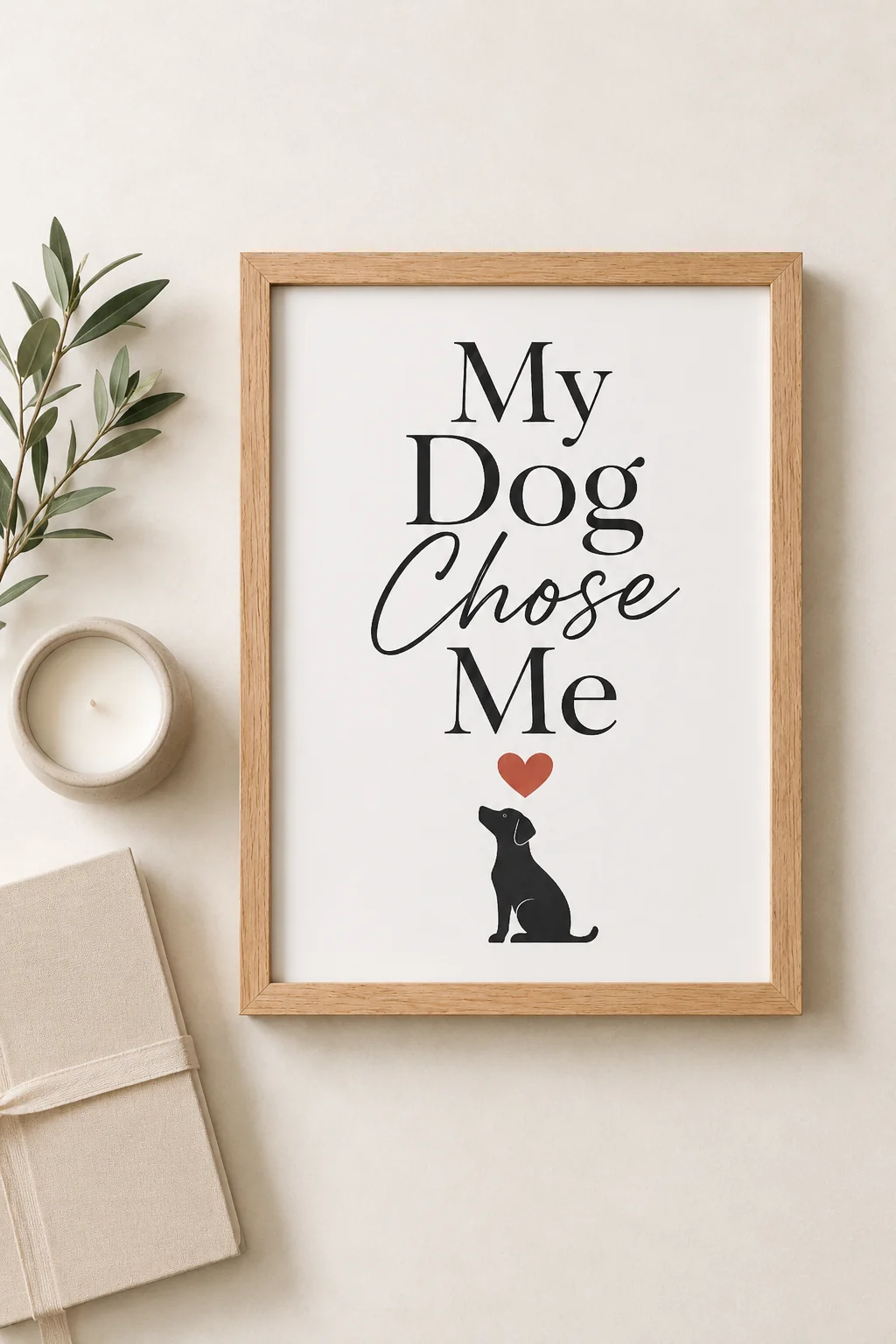 Top-down arrangement featuring My Dog Chose Me wall art with two complementary unbranded products on a neutral surface